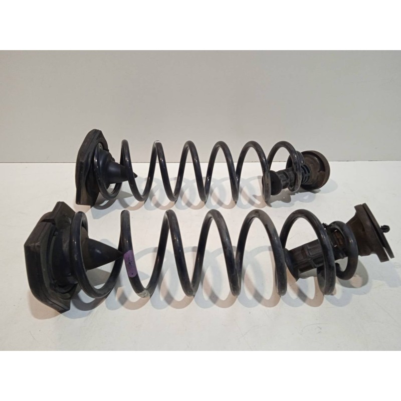 Recambio de muelle amortiguacion trasero para renault scenic iii dynamique referencia OEM IAM   